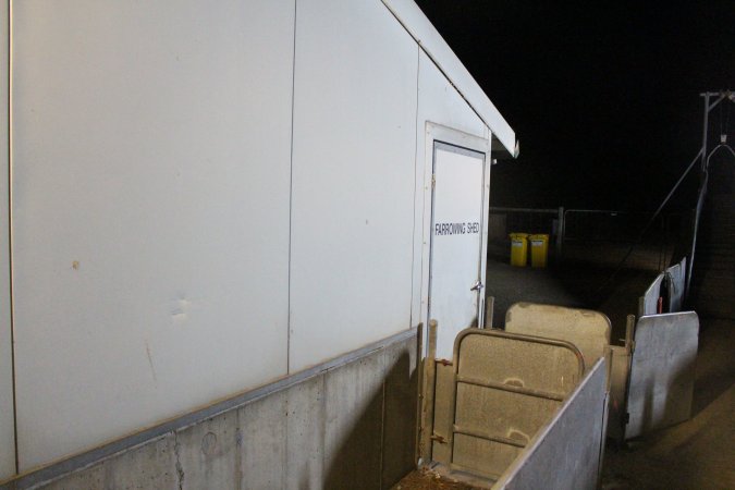 Door to farrowing shed from outside