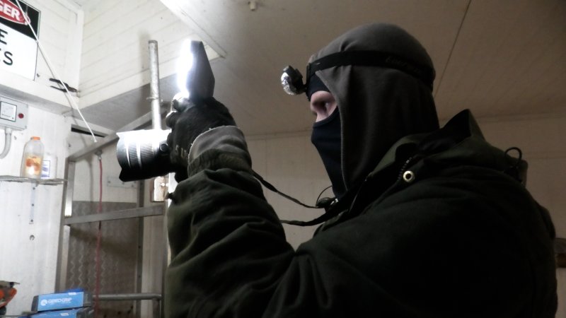 An investigator films inside the kill room
