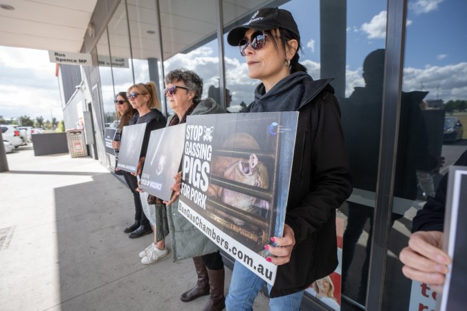 Protesters rallying outside Ros Spence MP's electorate office in Craigieburn