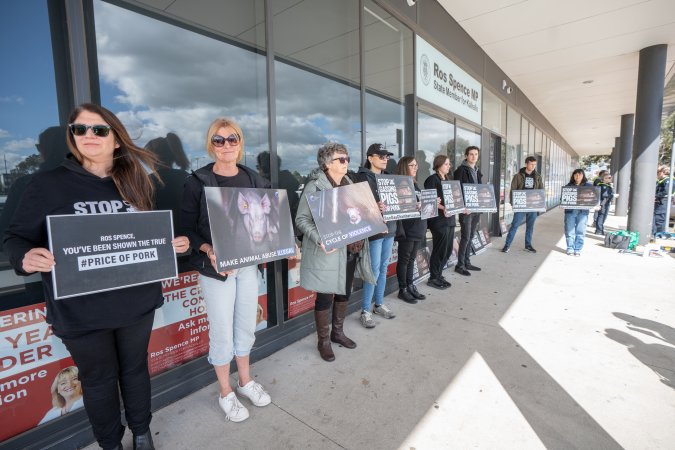 Protesters rallying outside Ros Spence MP's electorate office in Craigieburn