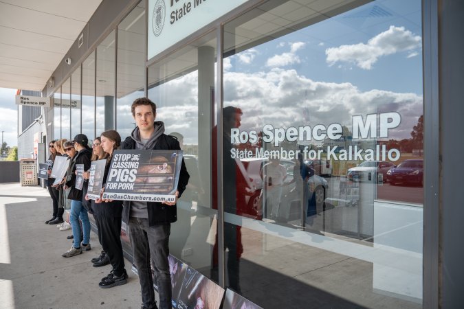 Protesters rallying outside Ros Spence MP's electorate office in Craigieburn