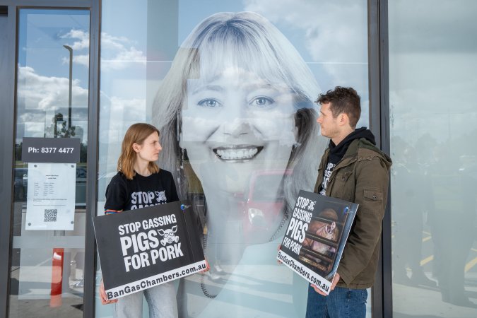 Protesters rallying outside Ros Spence MP's electorate office in Craigieburn