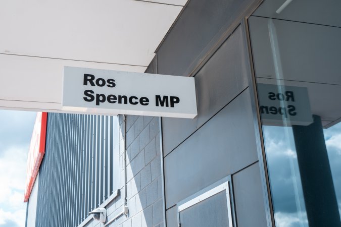 Protesters rallying outside Ros Spence MP's electorate office in Craigieburn