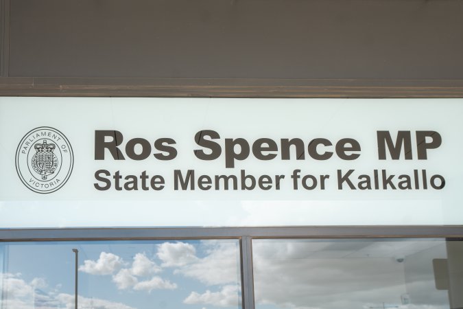 Protesters rallying outside Ros Spence MP's electorate office in Craigieburn