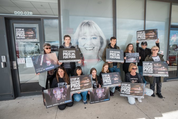 Protesters rallying outside Ros Spence MP's electorate office in Craigieburn