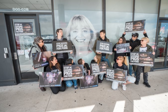 Protesters rallying outside Ros Spence MP's electorate office in Craigieburn