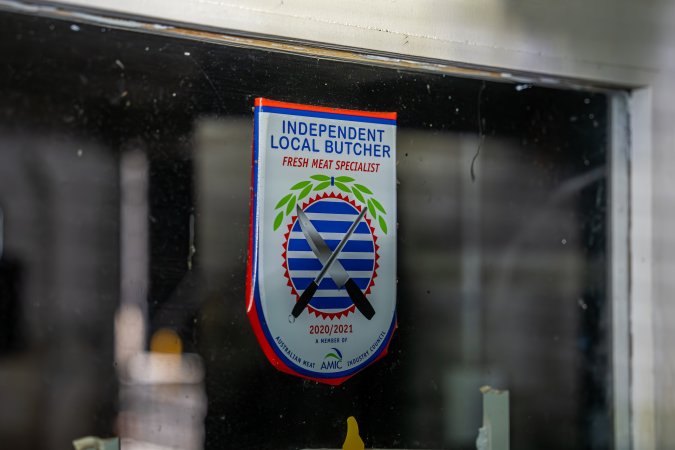 Sign of AMIC certification placed on the office door at Millmerran Meats slaughterhouse