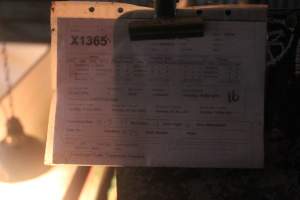 Clipboard with details of sow in crate - Captured at Glasshouse Country Farms, Beerburrum QLD Australia.