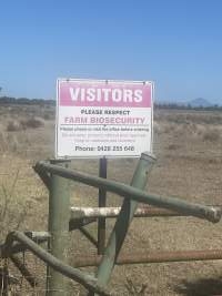 Sign at entrance by dirt road - Captured at Welcannah Feedlot, Moree NSW Australia.