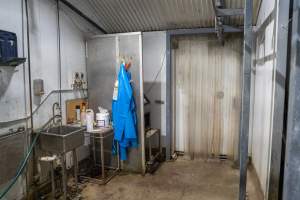 Aprons and knives hanging in the kill room - Captured at Crows Nest Meatworks, Crows Nest QLD Australia.